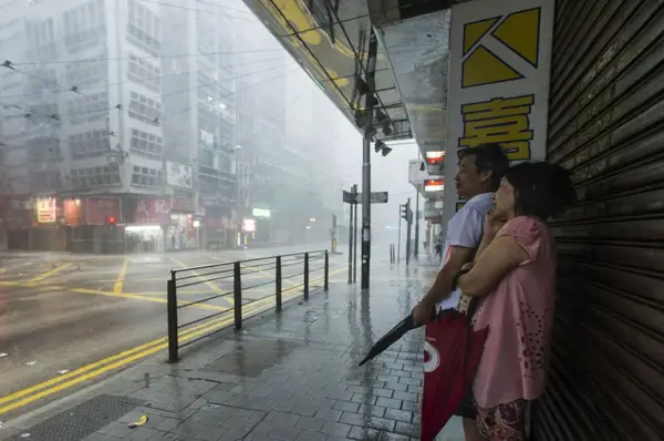 Why Hong Kong Typhoon Is Bad News for Domestic Helpers